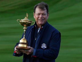 U.S. captain Tom Watson holds the Ryder Cup at Gleneagles in Scotland on Tuesday, Sept. 23, 2014. (Russell Cheyne/Reuters)
