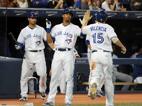 Blue Jays fielder Dalton Pompey (centre) continues to impress in the field and on the basepaths with less than a week to go in the season. (Dan Hamilton/USA TODAY Sports)