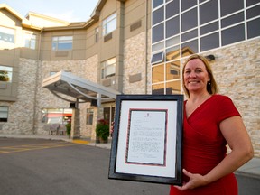 Deb Crowe, of the new Prince George Retirement Residence in Lucan, holds a letter from the private secretary of the Duchess of Cambridge. (Mike Hensen/The London Free Press)