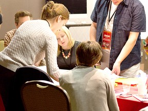 Chatham native Jason Brown, right, works with other young delegates about re-imagining a new Canada during the New Canada Conference that was held in Charlottetown, Aug. 31 to Sept. 1. The event marked the 150th anniversary of the Charlottetown Conference in 1864.