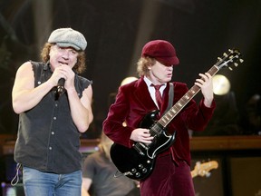 AC/DC's Brian Johnson, left, and Angus Young. (QMI Agency file photo)
