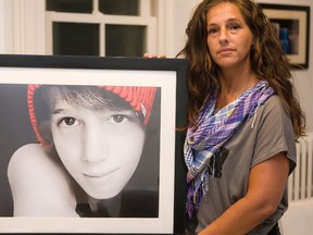 Janet Petrella holds a photo of her son, Chazz Petrella. (PETE FISHER/QMI Agency)