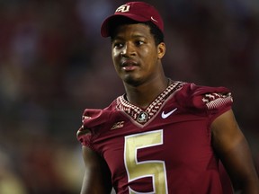 Jameis Winston #5 of the Florida State Seminoles on the field during pregame against the Clemson Tigers at Doak Campbell Stadium on September 20, 2014 in Tallahassee, Florida.  (Ronald Martinez/Getty Images/AFP)