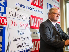 Doug Ford declares Friday “Take John Tory to Work Day” during a press conference at his campaign headquarters Wednesday, Sept. 24, 2014. (Ernest Doroszuk/Toronto Sun)