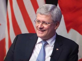 Prime Minister Stephen Harper speaks during a question and answer session at Goldman Sachs in the Manhattan borough of New York September 24, 2014.    REUTERS/Carlo Allegri