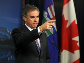 Alberta Premier Jim Prentice speaks to the media on his government to Improve accountability and entitlement during a news conference at the Legislature in Edmonton, Alberta on September 24, 2014. Perry Mah/Edmonton Sun/QMI Agency