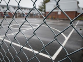 A chain link fence encloses the basketball court in a public housing complex on Millbank Dr. and Southdale Rd. in London (File photo)