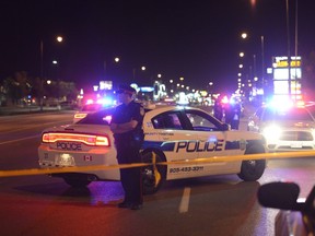 Officers on the scene of a deadly police shooting Wednesday night. (ANDREW COLLINS, Special to the Toronto Sun)