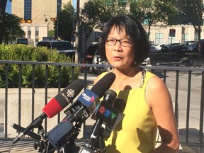 Mayoral candidate Olivia Chow speaks to reporters on Thursday, Sept. 25, 2014. (DON PEAT/Toronto Sun)