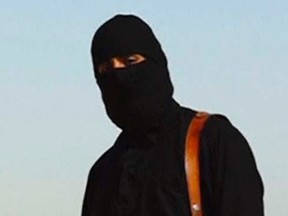 Masked militant in video released by the Islamic State in September, 2014.  REUTERS/Social Media Website via REUTERS TV