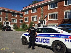 Ottawa Police are investigating a suspicious death at 347 Lacasse Avenue in the Vanier area of Ottawa. September 25, 2014. Errol McGihon/Ottawa Sun/QMI Agency