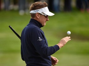 European Ryder Cup player Ian Poulter juggles his ball on the third green during practice ahead of the 2014 Ryder Cup at Gleneagles in Scotland on September 25, 2014. (REUTERS/Toby Melville)