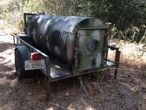 A set up bear trap is shown in this undated handout photo provided by the California Department of Fish and Wildlife. Traps were set after a California woman was attacked by a 200-pound black bear in a rural area of central California, suffering bites, scratches and a broken rib, state fish and wildlife officials said on September 25, 2014.  REUTERS/California Department of Fish and Wildlife/Handout