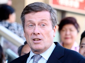 Mayoral candidate John Tory on Thursday, Sept. 25, 2014, in Chinatown. (Veronica Henri/Toronto Sun)