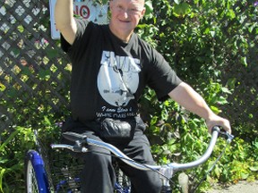 Ross Matlack and his new wheels, bought by an anonymous benefactor to replace a stolen machine.
Contributed