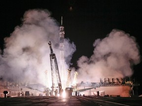 The Soyuz TMA-14M spacecraft carrying the International Space Station crew of Barry Wilmore of the U.S., and Alexander Samokutyaev and Elena Serova of Russia blasts off from the launch pad at the Baikonur cosmodrome September 26, 2014. The Russian rocket blasted off from the Baikonur Cosmodrome in Kazakhstan to the International Space Station (ISS) on Friday, taking to orbit a U.S.-Russian trio including the first Russian woman to serve on the $100 billion space outpost.  REUTERS/Shamil Zhumatov