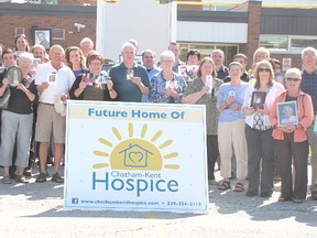 Several individuals and organizations gathered at the site of the new residential hospice in Chatham on Sept. 25 to launch a new campaign for the project. With many bringing photos of loved ones, they pledged $250,000 for the hospice, and challenged people across Chatham-Kent to  match that total during the “Thanks for Giving” campaign.