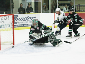 Saints forward Jake Mykitiuk (in white) watches as his goal trickles past Drayton Valley Thunder goaltender Marc Olivier Daigle in Saturday’s game. - Kyle Muzyka, Freelance Contributor