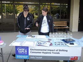 After earning the top spot at the Quinte Regional Science Fair, Holly Tetzlaff of Trenton, Ont. right, went on winning the Canada-Wide Science Fair in Windsor, Ont. last May, above, with her project 'Environmental Impact of Shifting Consumer Hygiene Trends'. - SUBMITTED PHOTO