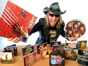 Brian Vollmer, frontman of the rock band Helix, is seen with some of the recordings he has made over his career. Vollmer has written a book about Helix marking 40 years, called Gimme an R. (MORRIS LAMONT, The London Free Press)
