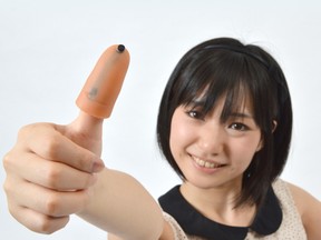 Thanko's  Yubi Nobiiru  thumb extender. (HO)