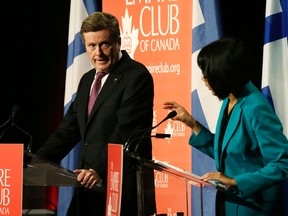 John Tory and Olivia Chow at the mayoral debate at the Empire Club  in Toronto on Sept. 26, 2014. (Craig Robertson/Toronto Sun)