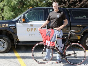 Jeff Walraven is a member of the Canadian National Police and Peace Officers? Memorial Ride to Remember steering committee. He welcomed riders from Niagara to a barbecue held at the Waterford Legion on Tuesday. Riders were en route to Aylmer where the official ride to Ottawa began on Wednesday. (SARAH DOKTOR/QMI Agency)
