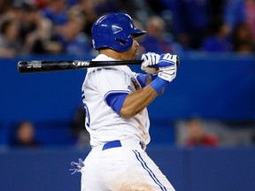 Blue Jays left fielder Dalton Pompey hits an RBI triple in the fifth inning against the Orioles during MLB action in Toronto on Friday, Sept. 26, 2014. (John E. Sokolowski/USA TODAY Sports)