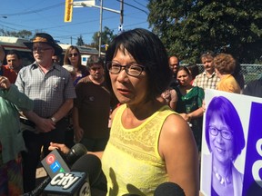 Olivia Chow with supporters on Sept. 27, 2014, at the opening of a new campaign office to serve York and Etobicoke. The office is on Jane St. near Maple Leaf Dr. (Don Peat/Toronto Sun)