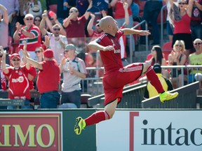 Toronto FC midfielder Michael Bradley celebrates scoring a goal during the second half in a game against the Portland Timbers at BMO Field on September 27, 2014. (Nick Turchiaro/USA TODAY Sports)