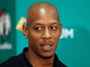 Keith Bogans enters the news conference as Boston Celtics introduce new players in Waltham, Massachusetts, July 15, 2013. (REUTERS/Dominick Reuter)