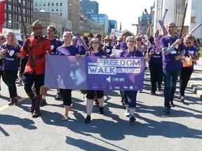 More than 200 people took part in Ottawa's inaugural [free-them] Freedom Walk Saturday, Sept. 27, 2014. The event, coinciding with the 5th annual Freedom Walk in Toronto, began at the Ottawa Convention Centre with speeches, followed by the 4K walk, wrapping on Parliament Hill.
KELLY ROCHE/OTTAWA SUN