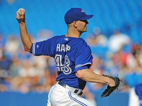 Toronto Blue Jays opening pitcher J.A. Happ (48) pitches in the first inning against Baltimore Orioles at Rogers Centre on Sep 27, 2014; Toronto, Ontario, CAN. (Peter Llewellyn/USA TODAY Sports)