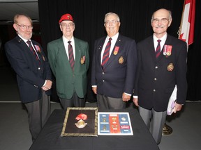 The remains of four Canadian soldiers in the First World War have been identified.  The announcement was made at Minto Armouries, with the Grenadiers Association (from left): Stan Lopata, Bill Quinn, Alex Taylor, and Vince Lopata.