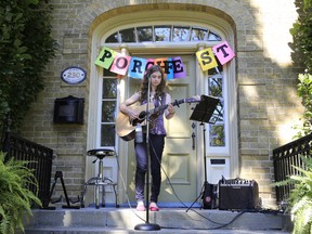 Pop music artist Julia Finnegan performs on Bridge Street East during the sixth edition of Belleville Porchfest Saturday, Sept. 27, 2014. - JEROME LESSARD/THE INTELLIGENCER/QMI AGENCY