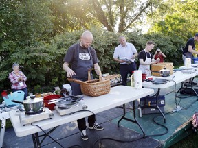 MPP of Prince Edward-Hastings Todd Smith, centre, challenges Prince Edward County chefs Elliot Reynolds of The Hubb at Angeline’s, right, Scott Kapitan of East and Main, second from right, and recent Chopped Canada winner Chef Neil Dowson of Agrarian Speakeasy as County Chopped, based on the popular TV show, returned to this year's TASTE Community Grown at Crystal Palace in Picton, Ont. Saturday, Sept. 27, 2014. - JEROME LESSARD/THE INTELLIGENCER/QMI AGENCY