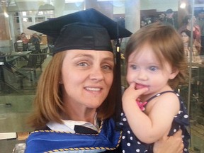 Lomond school’s new principal Kim Kerr with her one-year-old daughter Cleo at a graduation ceremony. 
Submitted photo