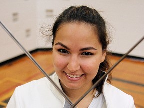 Fencer Daria Joquera Palmer is seen at practice in Winnipeg, Man., Sunday, September 28, 2014. (Brian Donogh/Winnipeg Sun/QMI Agency)
