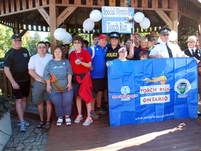 Dozens of people participated in the Law Enforcement Torch Run for Special Olympics held in Ingersoll Saturday morning. All the money raised through the event is used to offset costs for local athletes.

TARA BOWIE/SENTINEL-REVIEW