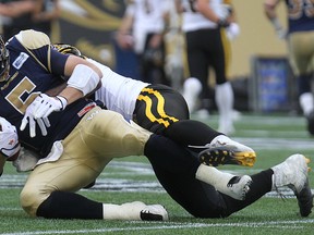 Drew Willy got sacked by the Tiger-Cats five times on Saturday. (KEVIN KING/Winnipeg Sun files)