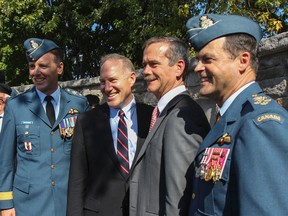 Royal Military College Commandant Brig.-Gen. Al Meinzinger, left, with Gen. Walter Natynczyk, president of the Canadian Space Agency, Col. Chris Hadfield and Chief of Defence Staff Gen. Thomas Lawson, at the 2014 Wall of Honour Ceremony at Royal Military College on Saturday. (Julia McKay/The Whig-Standard)