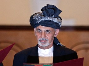 Afghanistan's new President Ashraf Ghani Ahmadzai takes the oath during his inauguration as president in Kabul Sept. 29, 2014.  REUTERS/Omar Sobhani