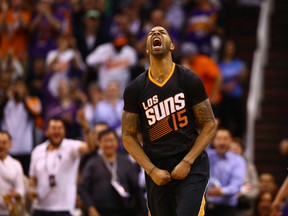 Phoenix Suns forward Marcus Morris celebrates after a fourth quarter play against the Oklahoma City Thunder at the US Airways Center. The Suns defeated the Thunder 128-122. (Mark J. Rebilas-USA TODAY Sports)