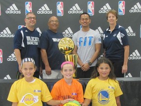 The Larry O'Brien Trophy, awarded each year to the champion of the National Basketball Association, made a brief visit to the WISH Centre in Chatham on Sunday, Sept. 28 where it was announced that the Chatham-Kent Wildcats organization has been chosen as one of 50 sites across Canada that will host the Junior NBA program. Front row, from left: Bella Burgos, 10, Brynn Larkin, 10 and Olivia Burgos, 8. Back row:Junior NBA coordinator for Chatham-Kent Jamie Ireland, Wildcats president Robin Dudley, NBA Canada representative Chris Alicpala and Wildcats treasurer/coach Catherine Day.