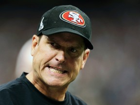 San Francisco 49ers coach Jim Harbaugh disputed reports of a rift between players and coaching staff. (Reuters)