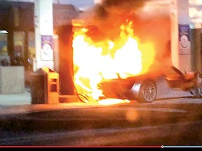 A Porsche 918 Spyder goes up in flames at a Caledon Esso gas station on Sunday. (YouTube frame grab)