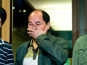 Lin Jun's father, Diran Lin, outside court in Montreal where Luka Magnotta is on trial for murder, on Monday, Sept. 29, 2014. (PIERRE-PAUL POULIN/QMI Agency)