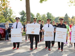 Emergency service leaders were among 63 men who took part in Sunday's Walk a Mile in Her Shoes fundraiser at Pinafore Park in St. Thomas. From left: Central Elgin Fire Chief Don Crocker, St. Thomas Fire Chief Rob Broadbent, Aylmer Police Chief Andre Reymer, St. Thomas Police Chief Darryl Pinnell and Elgin OPP Staff Sgt. Greg Dafoe. 

Contributed photo