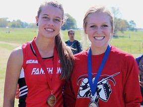 Loyalist College runner Ashley Bickle (right) poses with race winner Morgan Hendricks of London Fanshawe at the St. Lawrence Invitational OCAA cross-country meet last weekend in Kingston. Bickle was second. (St. Lawrence College photo)