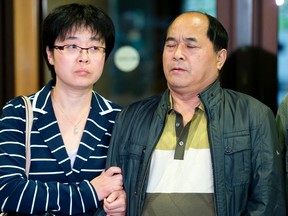 Jun Lin 's father , Lin Diran , during a press conference at the courthouse in Montreal in the framework of the first day of the trial of Luka Rocco Magnotta , Monday, Sept. 29, 2014. (PIERRE- PAUL POULIN / LE JOURNAL DE MONTRÉAL / QMI AGENCY)